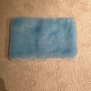 Faux fur neck scarf.
